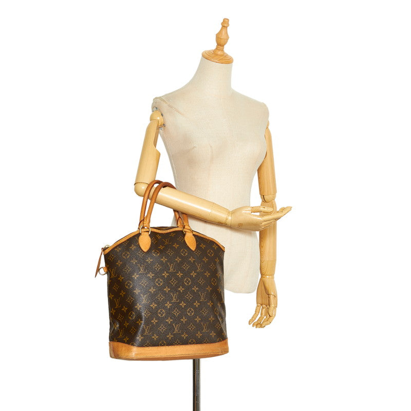 Louis Vuitton Monogram Rockit MM Handbag